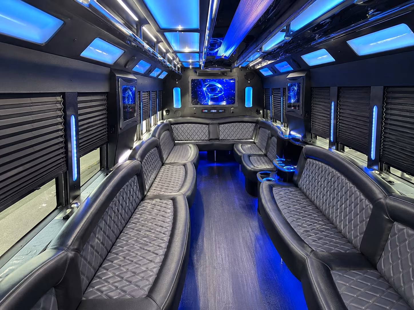Group beside a Mercedes Sprinter limo in Lexington